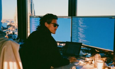 man_Entrepreneur_using_AI_with_2_screens
