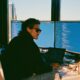 man_Entrepreneur_using_AI_with_2_screens