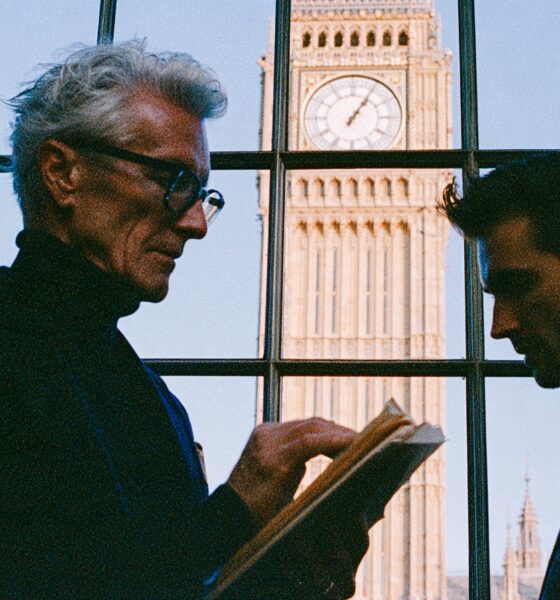 A father and son entrepreneur in London looking through inheritance tax projections before succession
