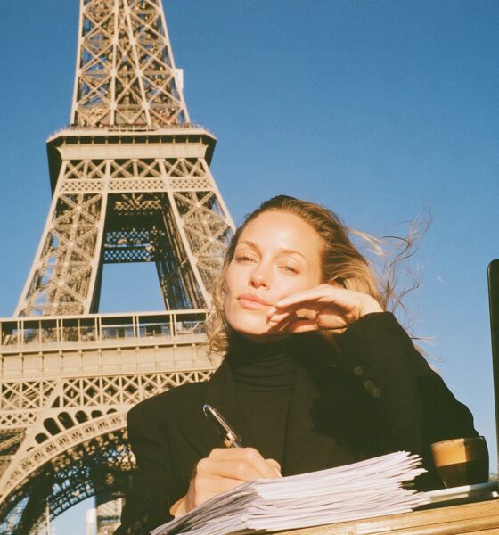 A female entrepreneur signing tax documents overseas