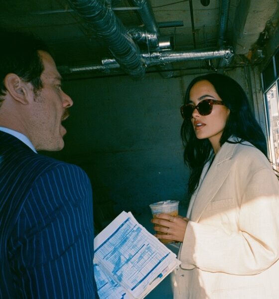 A male franchise owner speaking with a female entrepreneur about a franchise deal on location