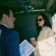 A male franchise owner speaking with a female entrepreneur about a franchise deal on location