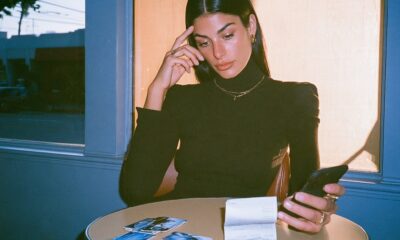 A woman looking at what money she has saved and what she can spend to purchase things