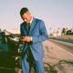 Entrepreneur man in a car crash on his phone
