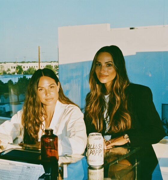 Female entrepreneurs with their beverage startup working on new flavors for their healthy soda beverage
