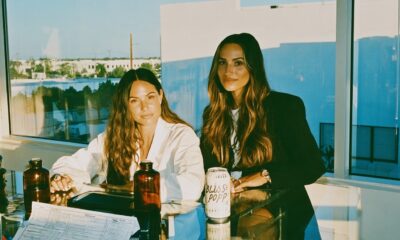 Female entrepreneurs with their beverage startup working on new flavors for their healthy soda beverage