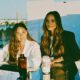 Female entrepreneurs with their beverage startup working on new flavors for their healthy soda beverage