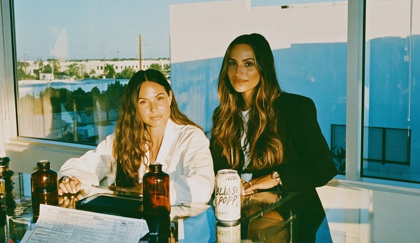 Female entrepreneurs with their beverage startup working on new flavors for their healthy soda beverage