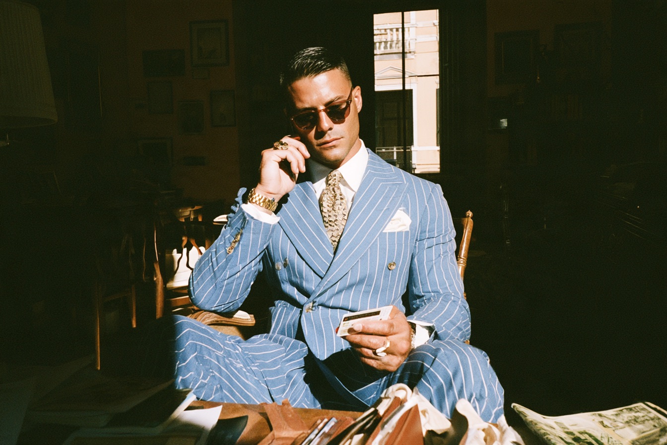 Wealthy entrepreneur man managing his money habits
