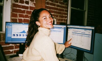 Woman looking at branding and marketing dashboard on her computer