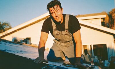 homeowner fixing minor roofing problems